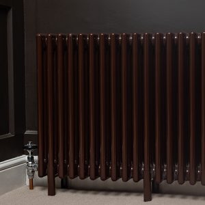 Low angled shot of chocolate brown Windsor Column with traditional nickel manual valves